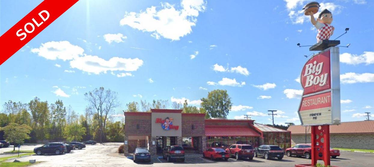 reataurant building with sold ribbon